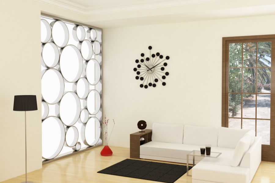 A modern living room featuring a bold 3D circle panel and a starburst wall clock as striking DIY wall decoration elements.